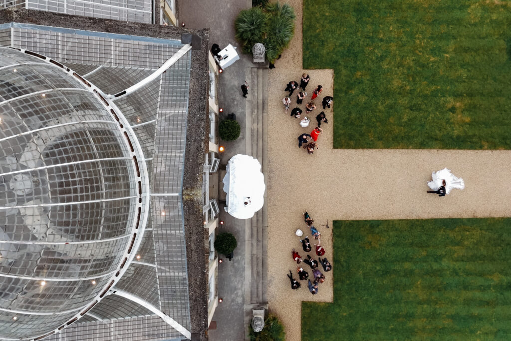 Editorial wedding photography of a young Gen Z fashion forward couple during their Russian luxury wedding at Syon Conservatory, London.