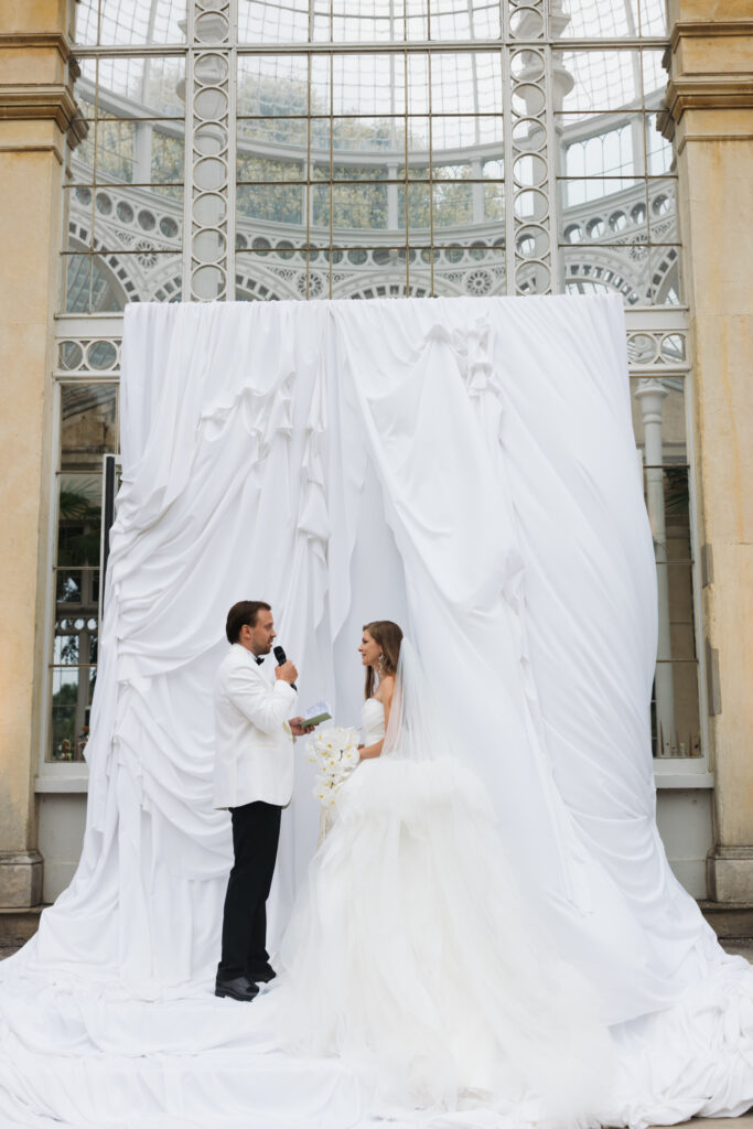 Editorial wedding photography of a young Gen Z fashion forward couple during their Russian luxury wedding at Syon Conservatory, London.