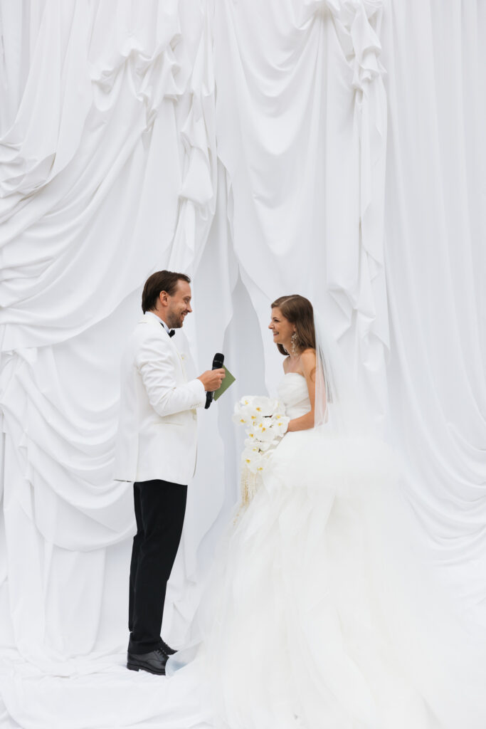 Editorial wedding photography of a young Gen Z fashion forward couple during their Russian luxury wedding at Syon Conservatory, London.