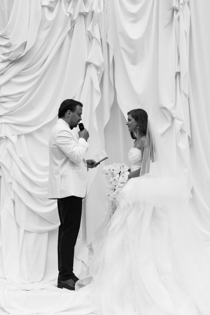 Editorial wedding photography of a young Gen Z fashion forward couple during their Russian luxury wedding at Syon Conservatory, London.