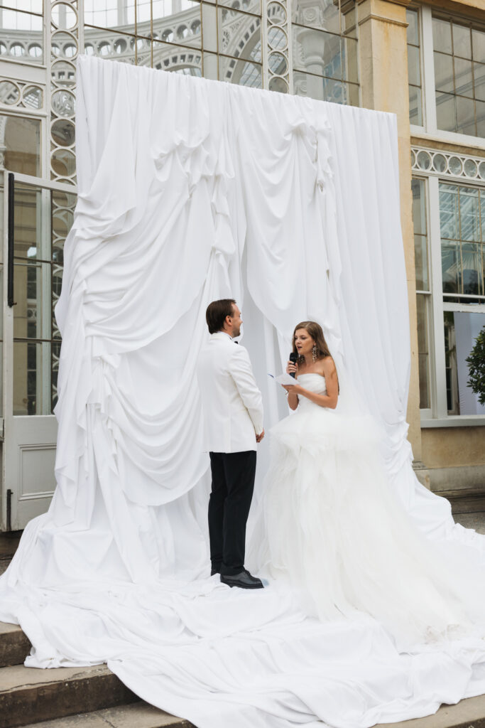 Editorial wedding photography of a young Gen Z fashion forward couple during their Russian luxury wedding at Syon Conservatory, London.