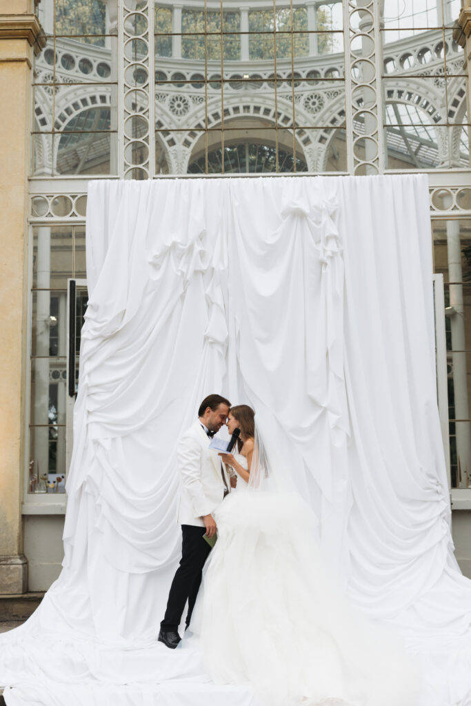 Editorial wedding photography of a young Gen Z fashion forward couple during their Russian luxury wedding at Syon Park Conservatory, London.