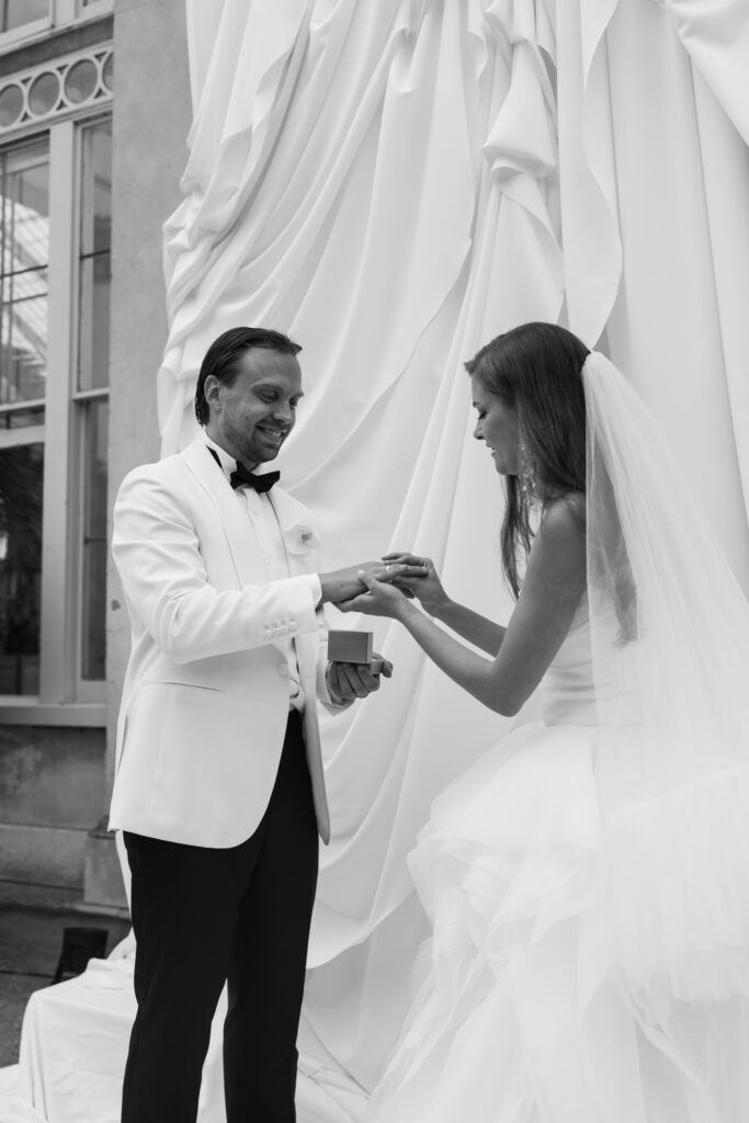 Editorial wedding photography of a young Gen Z fashion forward couple during their Russian luxury wedding at Syon Park Conservatory, London.